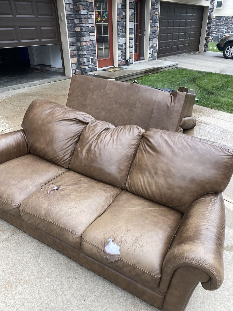 Large sectional furniture ready to be removed from a home